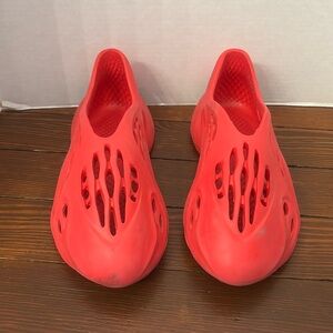 Red size European 44 rubber slip ons
